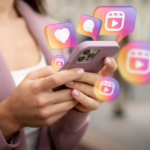 Icons do Instagram saindo de um celular